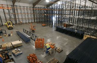 Installation team builds high density pallet rack for cold storage